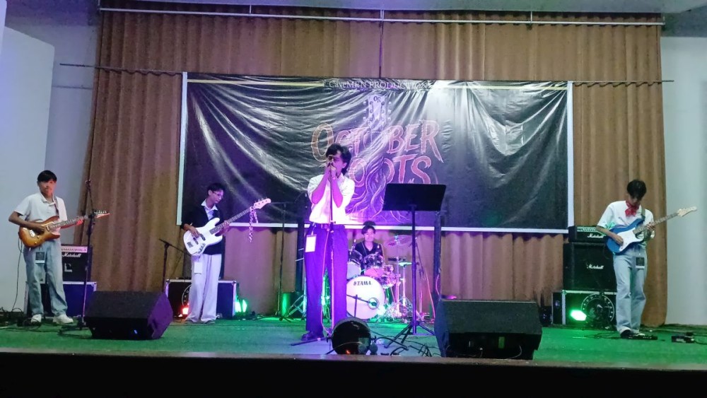 A musical band performs on stage during the October Roots Vol-1 2026 held at the State Academy Hall, Kohima, on October 19.
